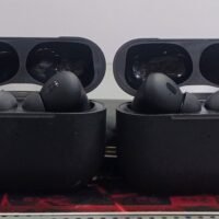 earbuds two pairs of matte black & white wireless earbuds matching  the AirPods Pro 2